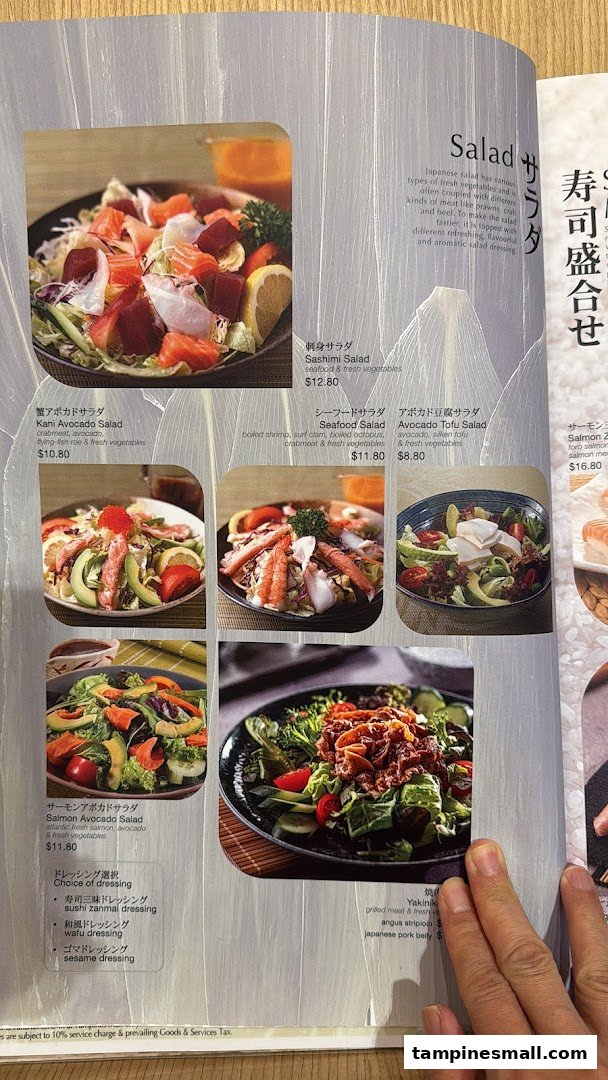 A detailed menu page from Sushi Zanmai featuring a variety of fresh Japanese salads with descriptions and prices.