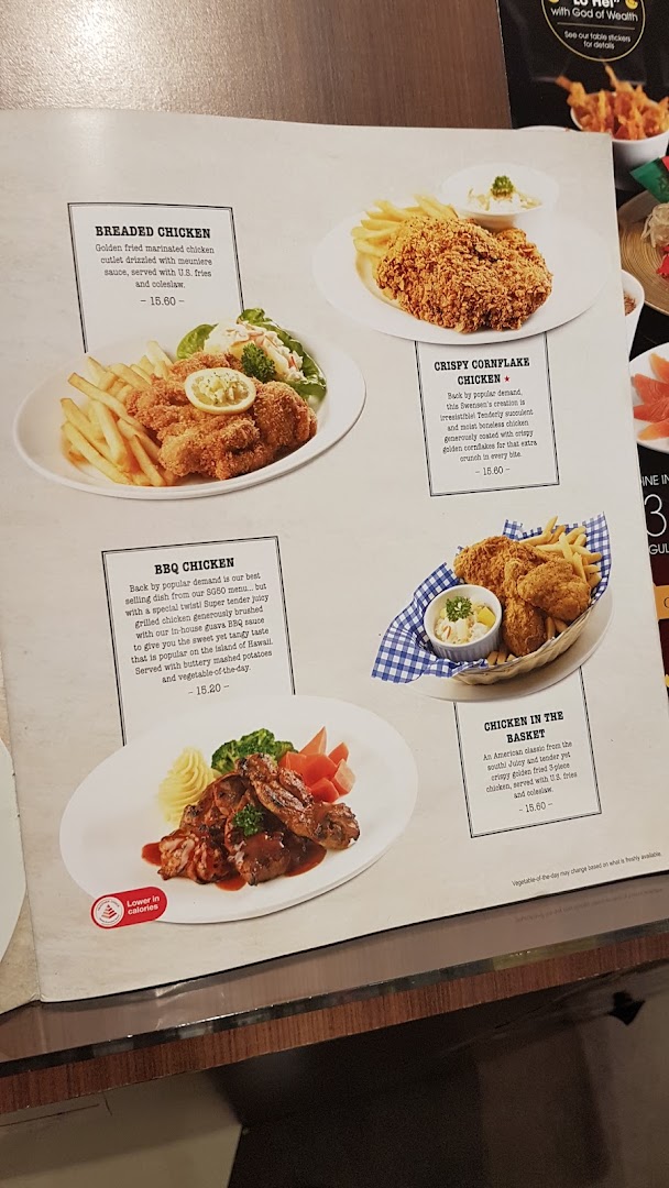 A close-up of Swensen's menu page showcasing various chicken dishes with descriptions and prices.