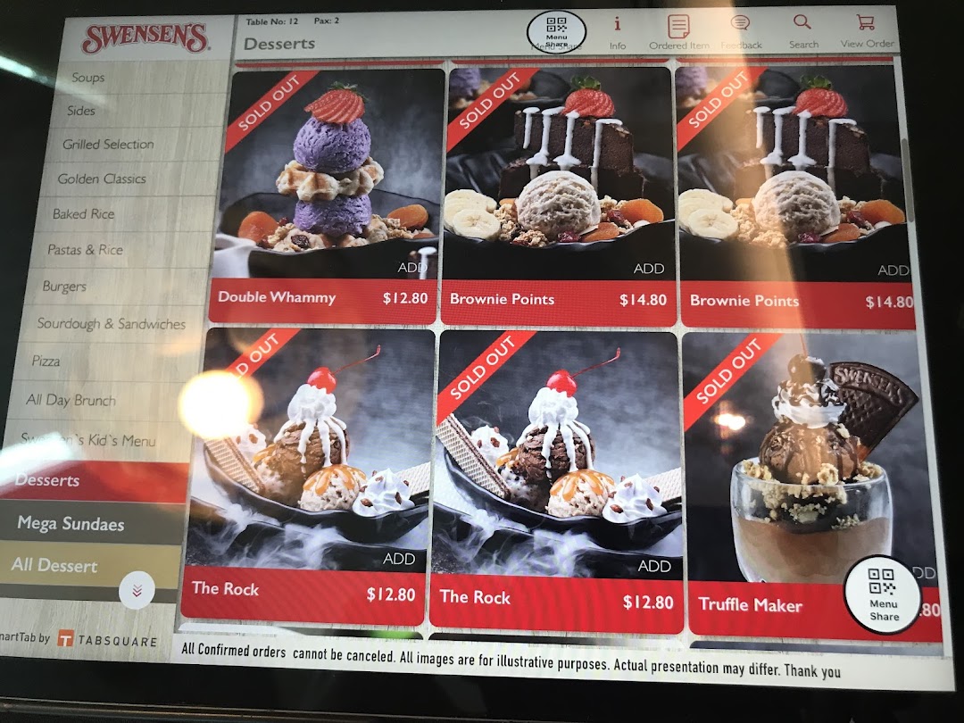 A digital menu display at Swensen's showing various dessert options, many marked as 'Sold Out'.