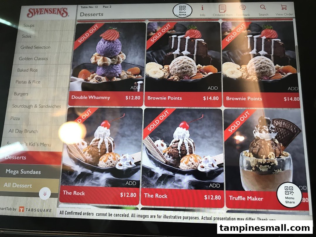 A digital menu display at Swensen's showing various dessert options, many marked as 'Sold Out'.