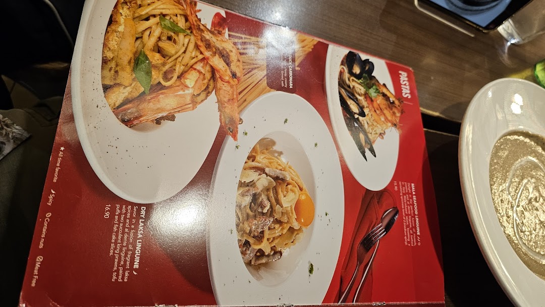 A close-up view of a Swensen's menu page featuring various pasta dishes with descriptions and prices.