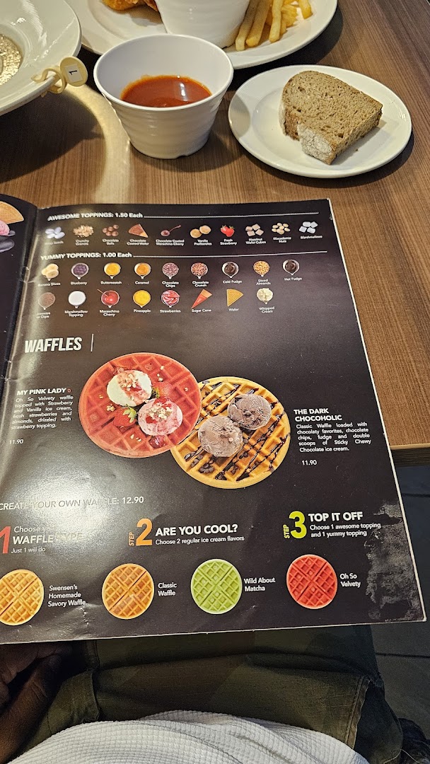A Swensen's menu displaying various waffle options, toppings, and ice cream flavors with prices.
