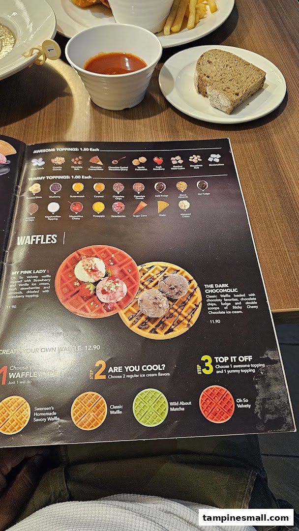 A Swensen's menu displaying various waffle options, toppings, and ice cream flavors with prices.