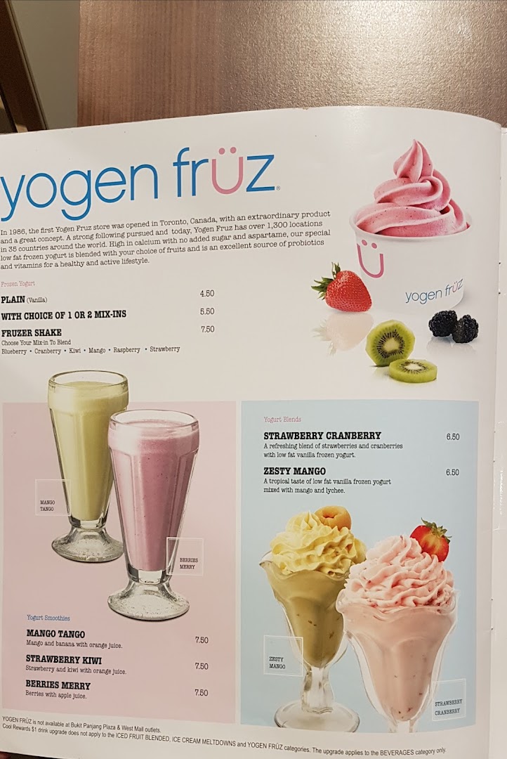 A vibrant menu displaying various frozen yogurt, yogurt blend, and smoothie options from Yogen Fruz.