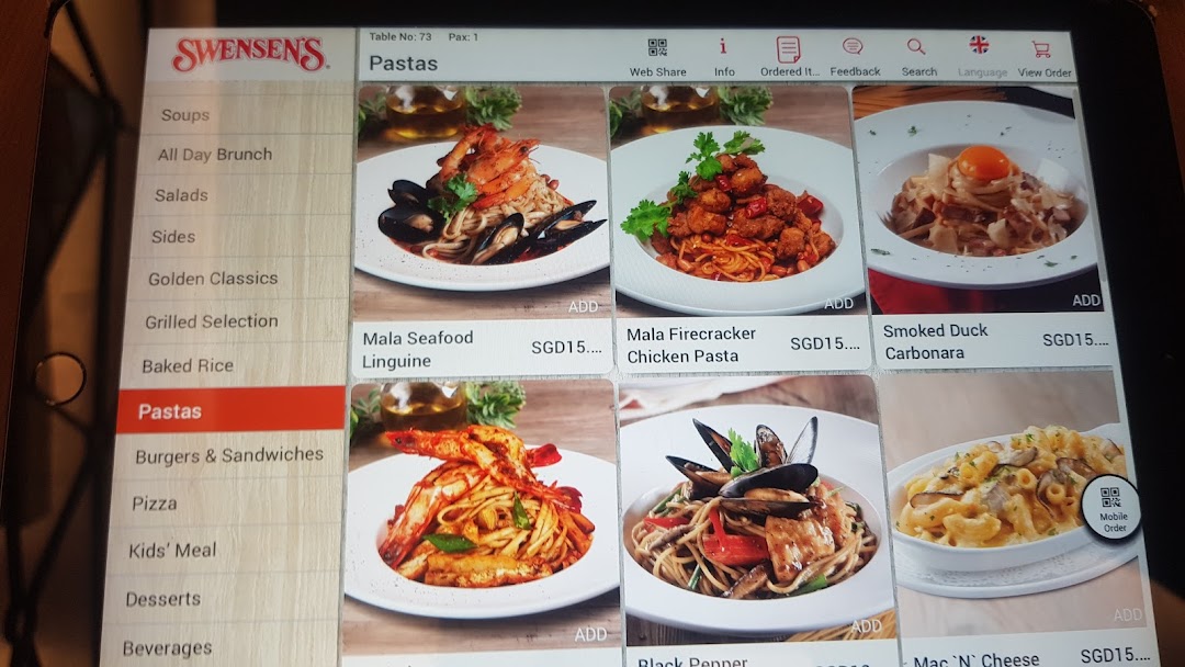 A digital menu from Swensen's, displaying various pasta dishes and menu categories on a tablet.