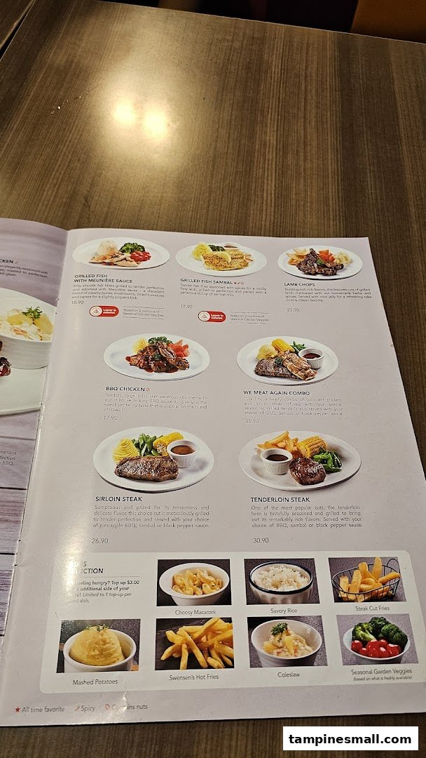 A detailed view of Swensen's menu featuring main courses like steaks, fish, chicken, and various side dishes.
