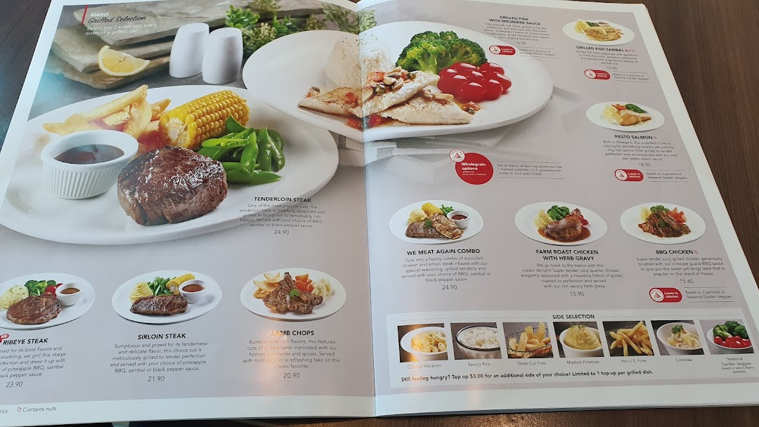A detailed view of Swensen's main course menu, featuring grilled selections and side dishes.
