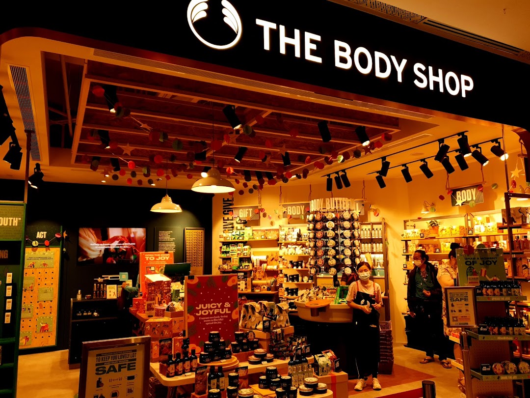 A vibrant interior view of The Body Shop, showcasing a wide array of beauty and body care products.