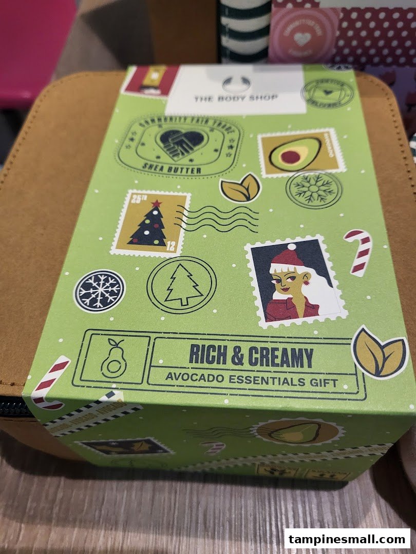 A festive 'Rich & Creamy Avocado Essentials Gift' set from The Body Shop, featuring shea butter and avocado.