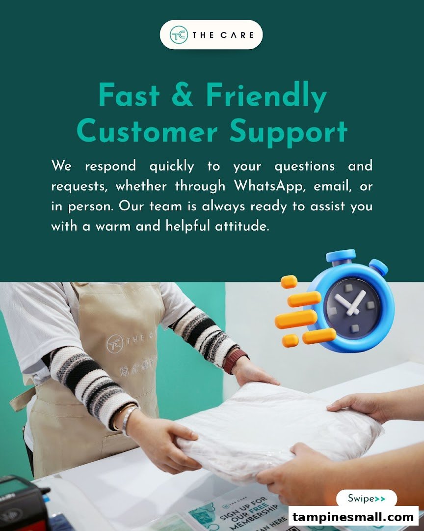 A laundry staff member assists a customer at the counter, highlighting fast and friendly customer support.