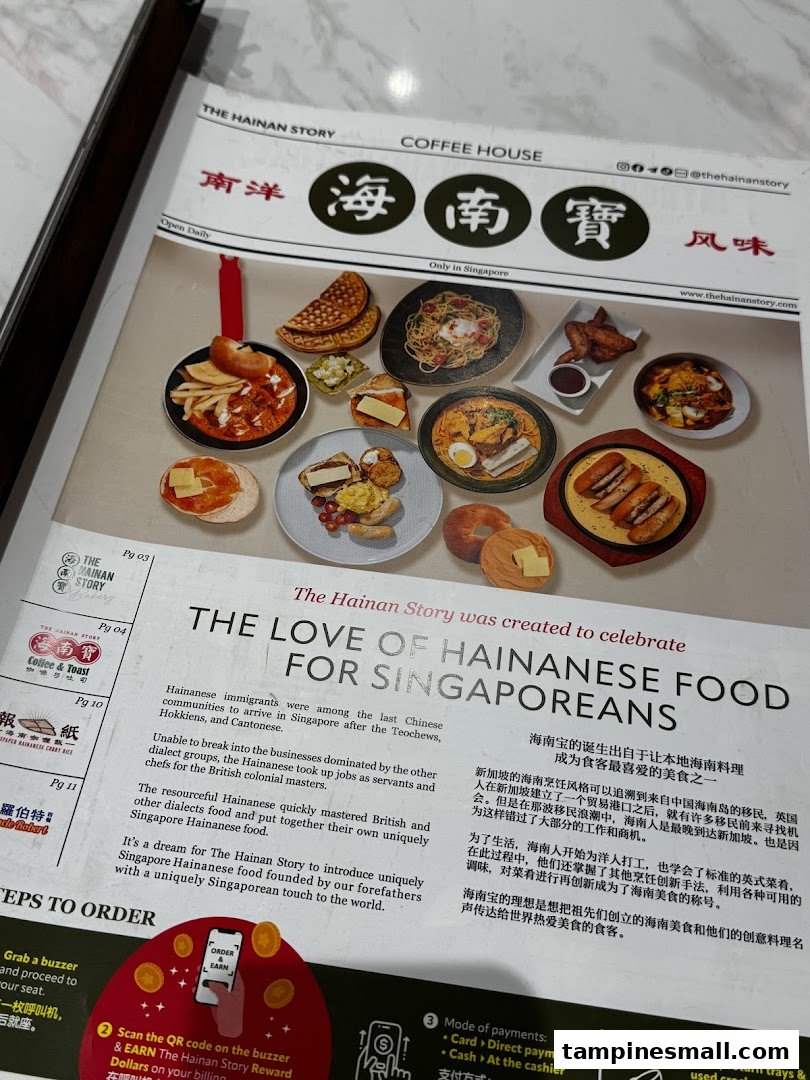 A close-up of The Hainan Story Coffee House menu, featuring various Hainanese dishes and a historical narrative.