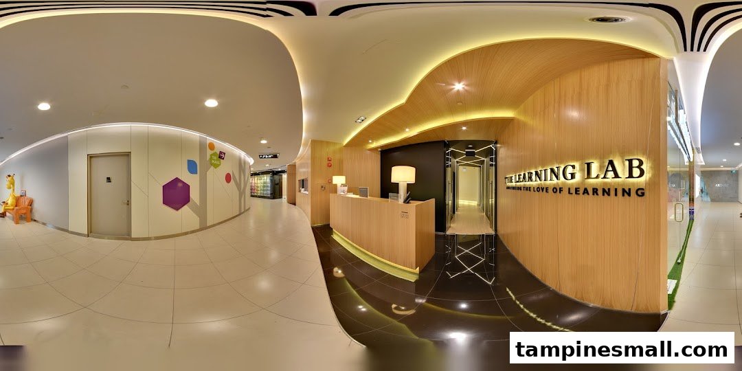 Modern and inviting entrance of The Learning Lab, featuring a reception desk and bright interior.