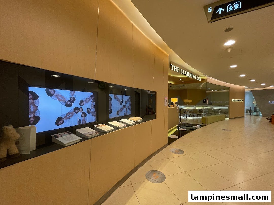 The Learning Lab's modern shop front features a digital display and inviting entrance in Tampines Mall.