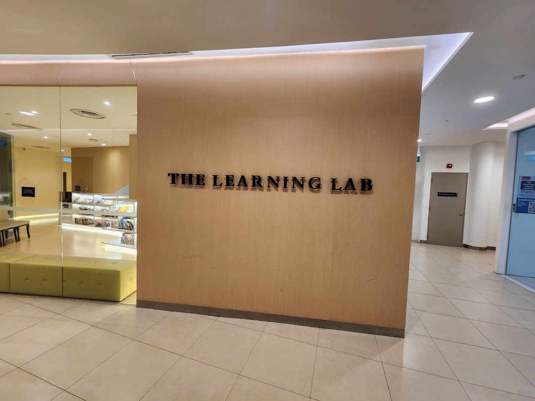 The entrance of The Learning Lab at Tampines Mall, featuring its prominent signage and a glimpse inside.