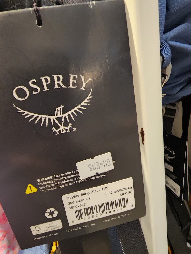Close-up of an Osprey Daylite Sling product tag showing price and product details.