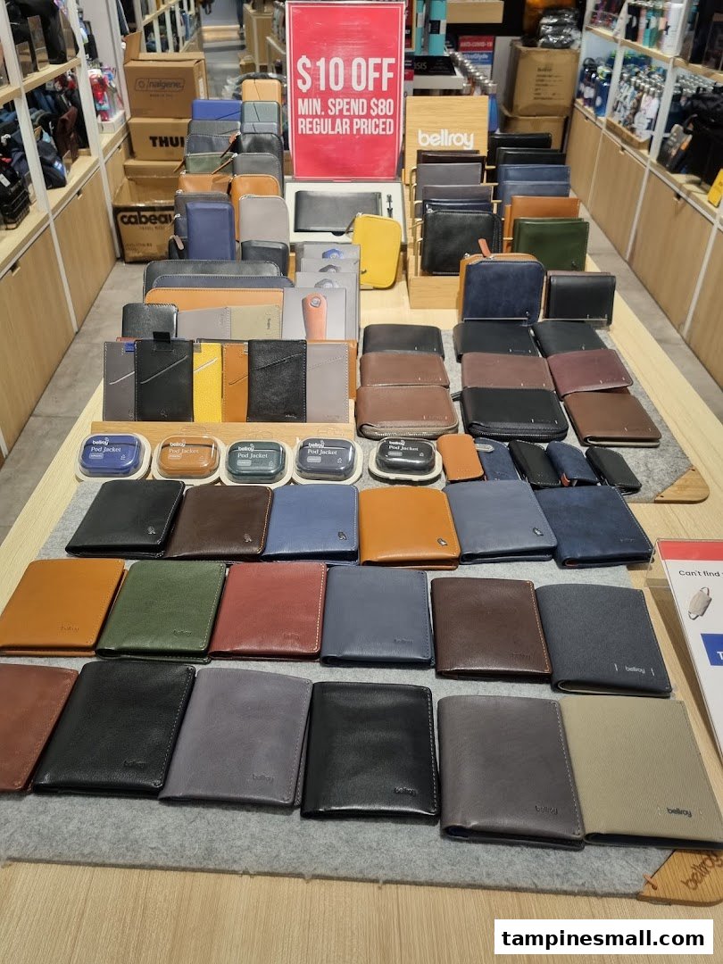 A vibrant display of various Bellroy wallets and accessories in different colors and styles.