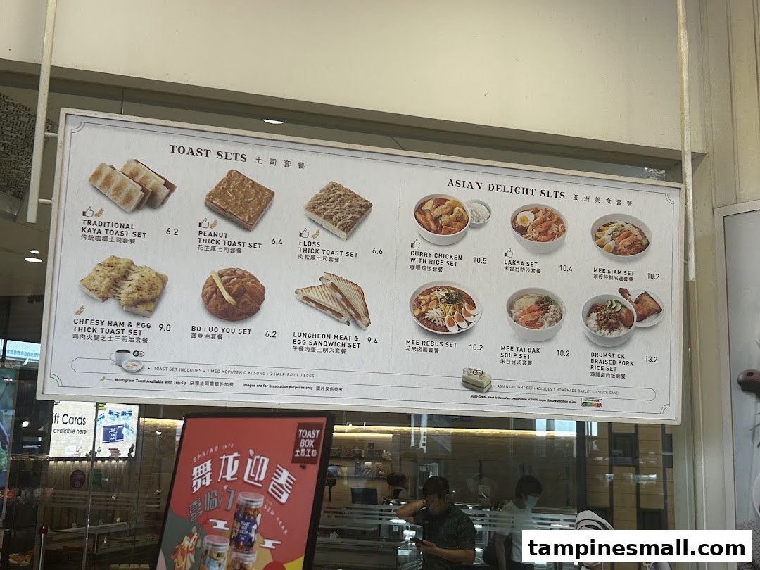 A comprehensive menu board displaying Toast Box's toast sets and Asian delight sets with prices.
