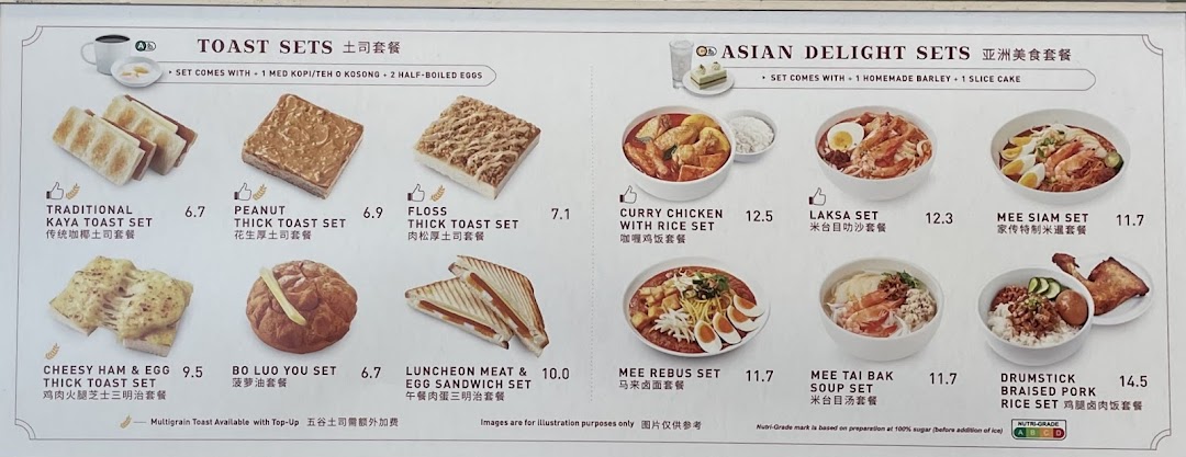 A detailed menu board displaying Toast Box's Toast Sets and Asian Delight Sets with prices.
