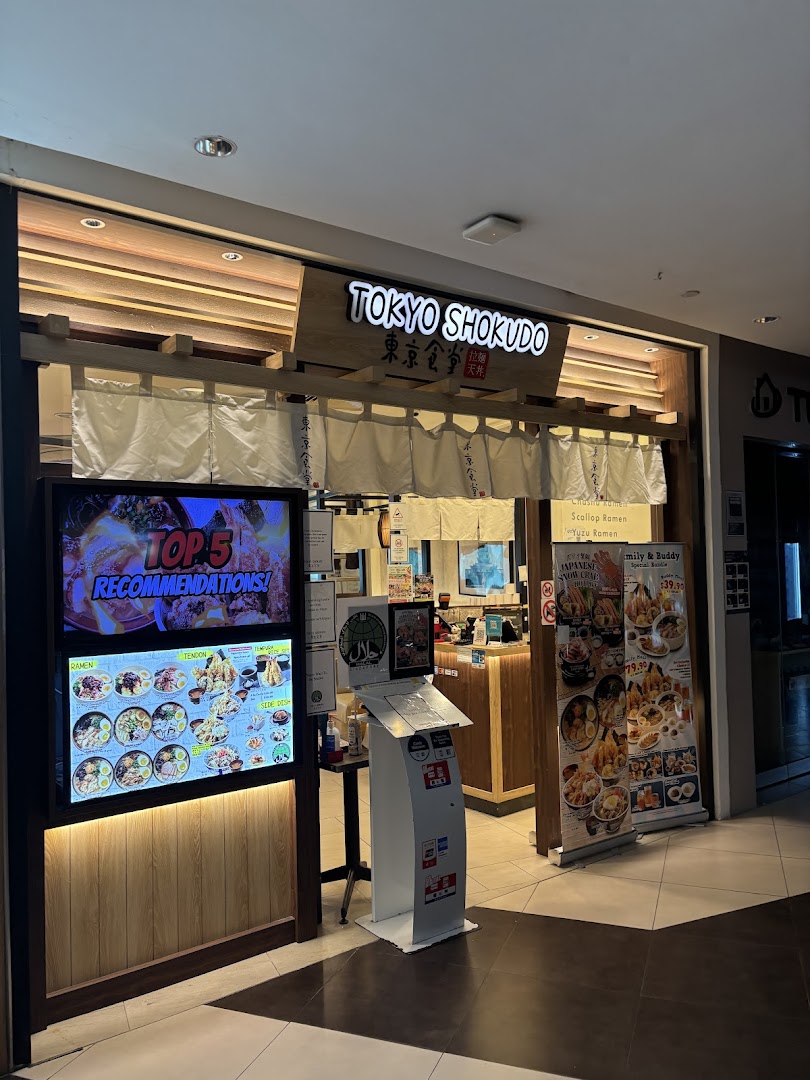 The shop front of Tokyo Shokudo, featuring a digital display with recommendations and promotional banners.
