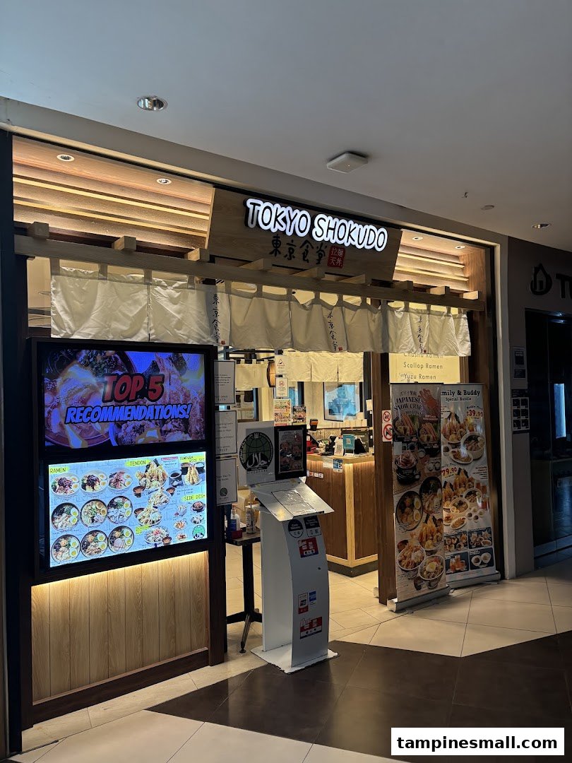 The shop front of Tokyo Shokudo, featuring a digital display with recommendations and promotional banners.