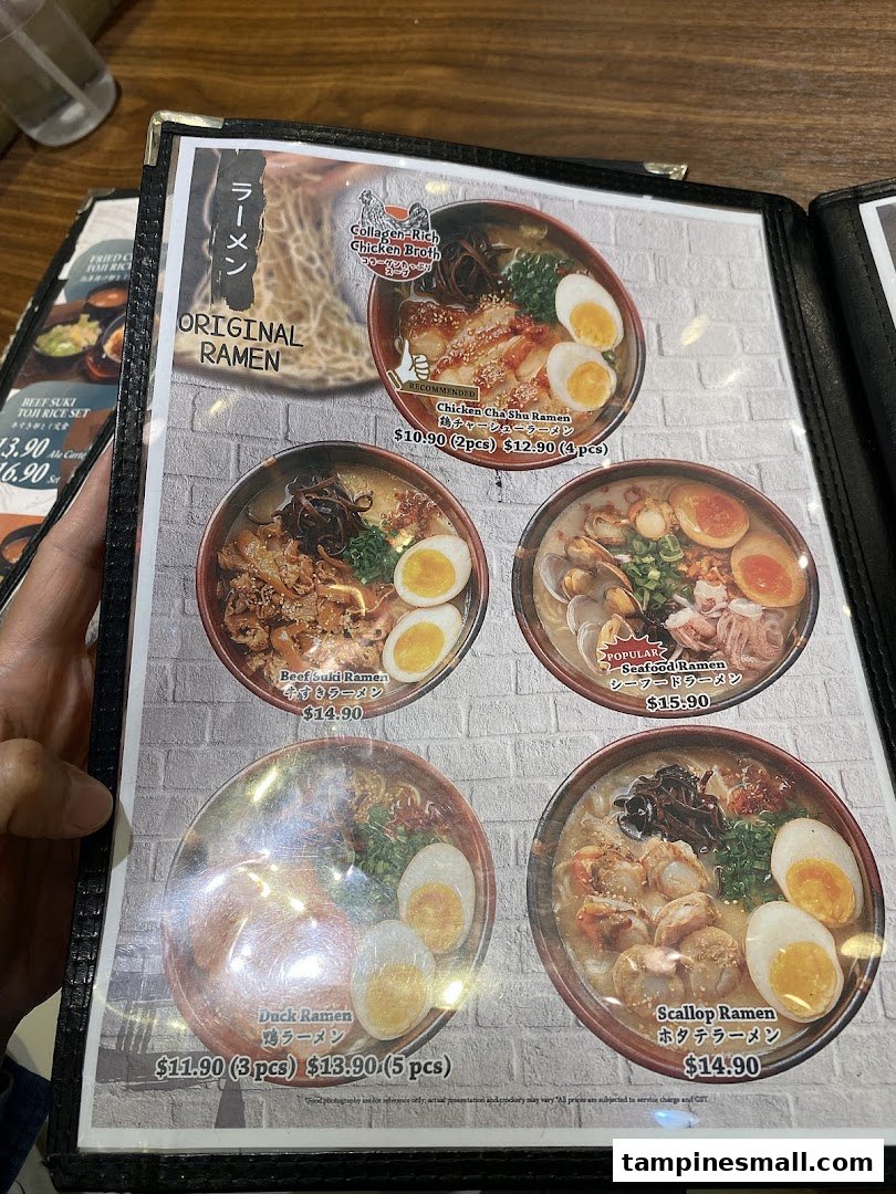 A close-up view of Tokyo Shokudo's ramen menu featuring various ramen dishes with prices.