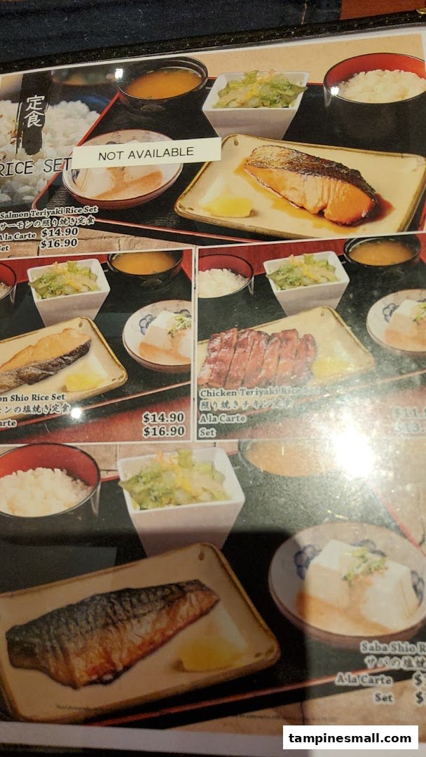 A close-up of a Japanese restaurant menu displaying various rice set meals.
