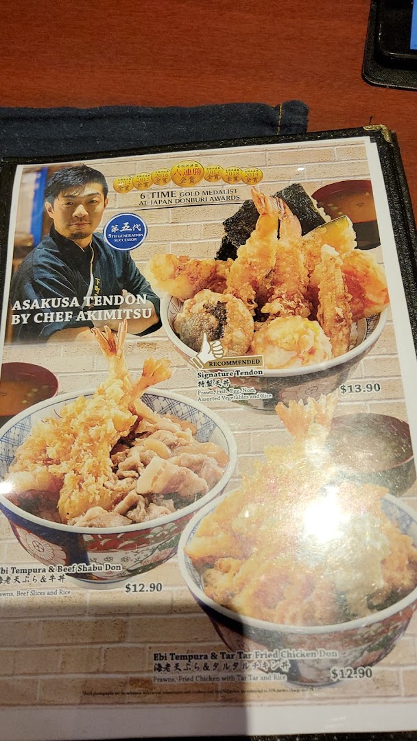 A menu page showcasing various Japanese donburi dishes, including award-winning tempura bowls.