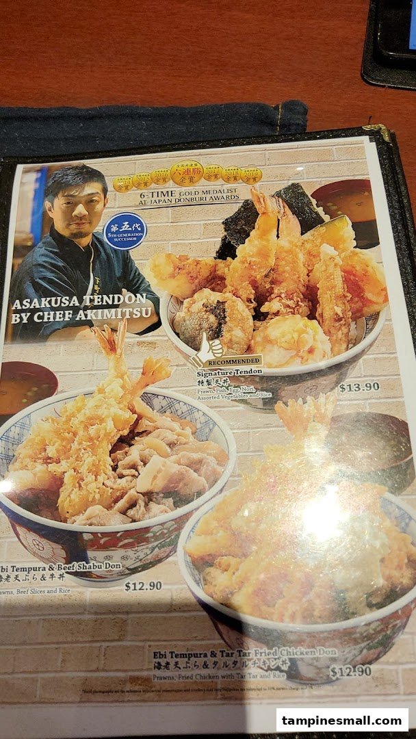 A menu page showcasing various Japanese donburi dishes, including award-winning tempura bowls.