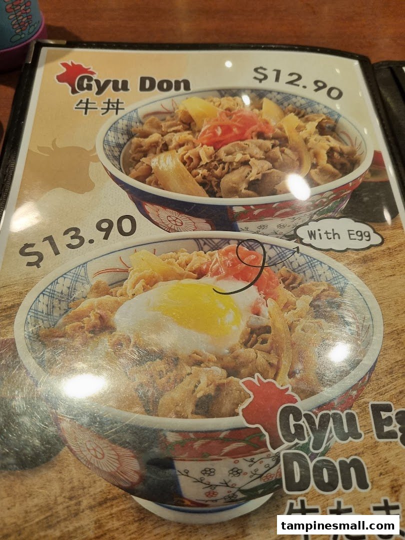 A menu page displaying two variations of Gyudon, a Japanese beef bowl dish, with prices.