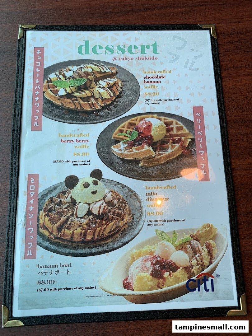 A dessert menu from Tokyo Shokudo featuring various handcrafted waffles and a banana boat.
