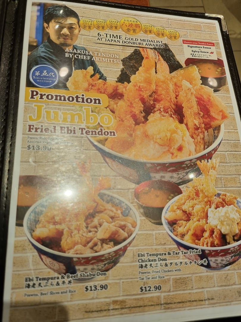 A menu displaying various Japanese donburi dishes, including tempura and beef options.
