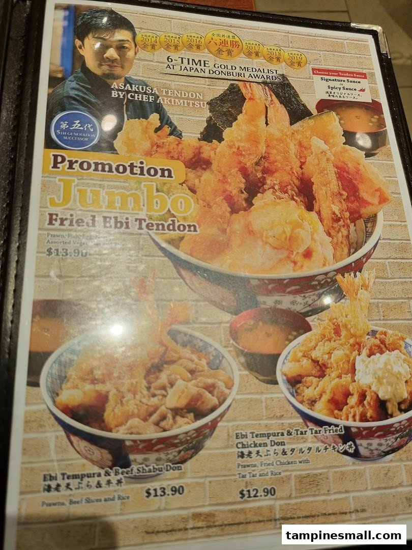 A menu displaying various Japanese donburi dishes, including tempura and beef options.