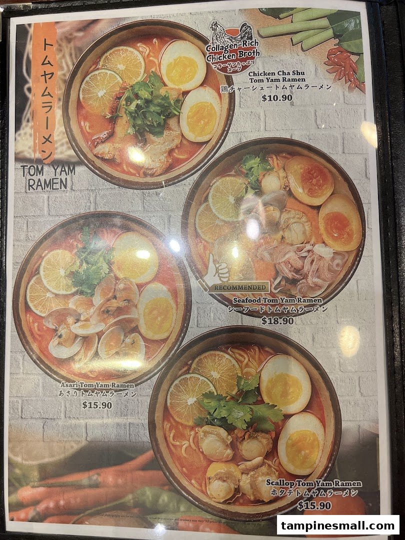 A menu page showcasing various Tom Yam Ramen dishes, including chicken, seafood, asari, and scallop options.