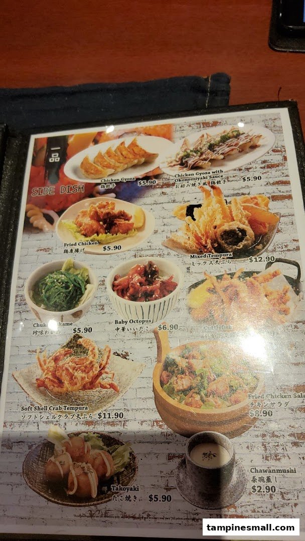 A menu page from Tokyo Shokudo featuring a variety of Japanese side dishes with prices.