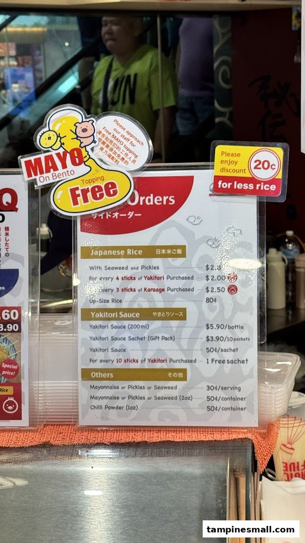 A detailed menu board displaying prices and options for rice, sauces, and toppings.