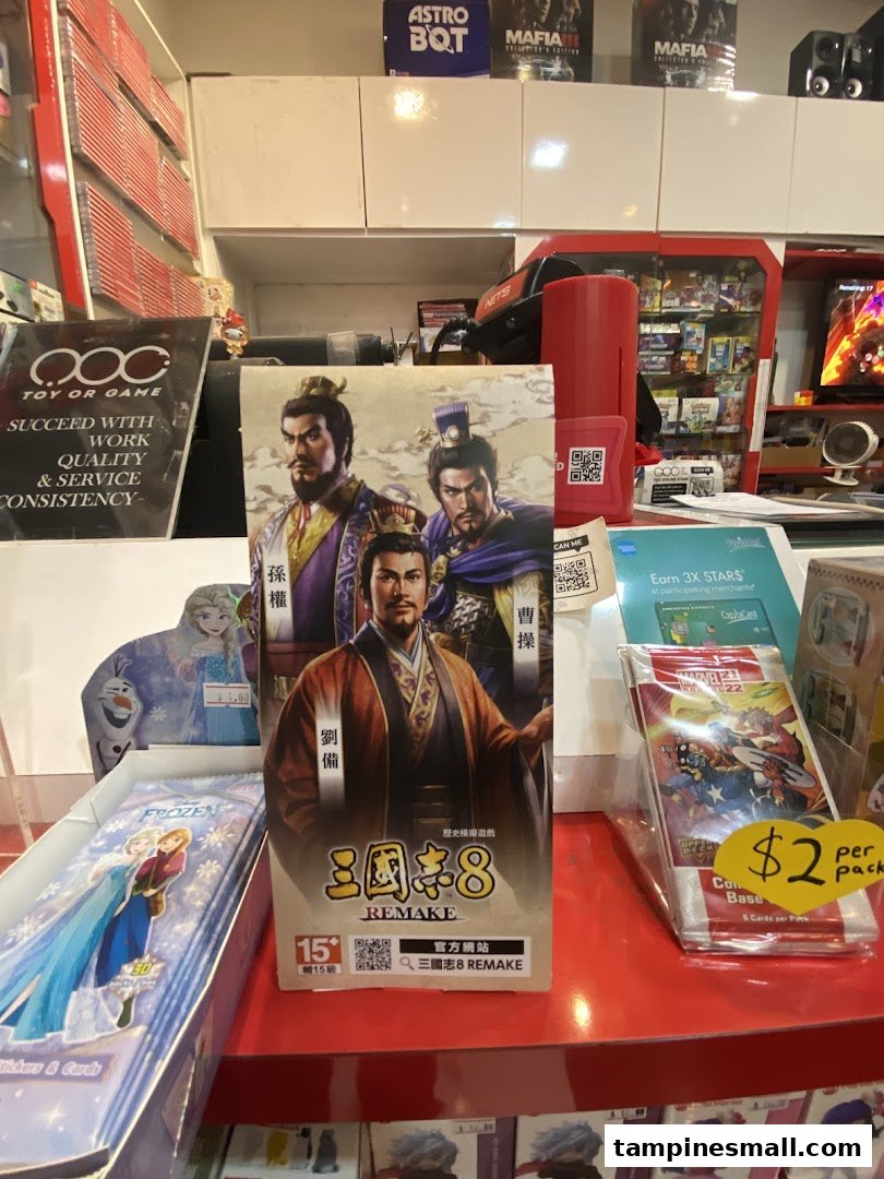 An interior shot of Toy Or Game, showcasing video games, trading cards, and collectibles.