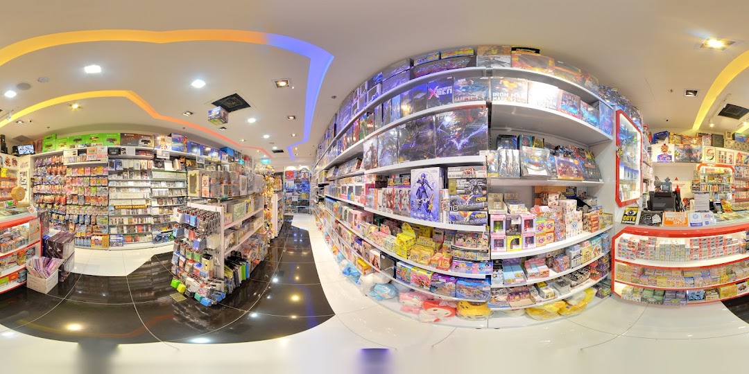 A wide-angle view of the vibrant interior of Toy Or Game, showcasing shelves packed with toys, games, and collectibles.