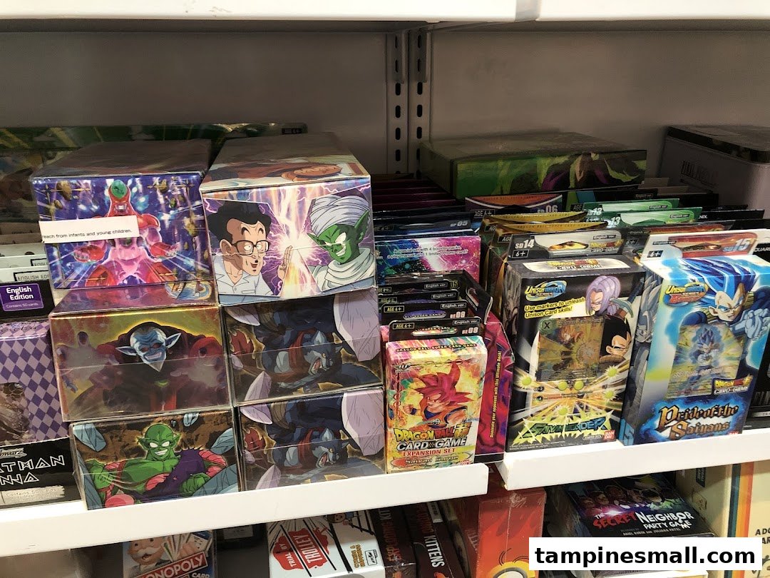 Shelves filled with various card games and board games, prominently featuring Dragon Ball Super Card Game.