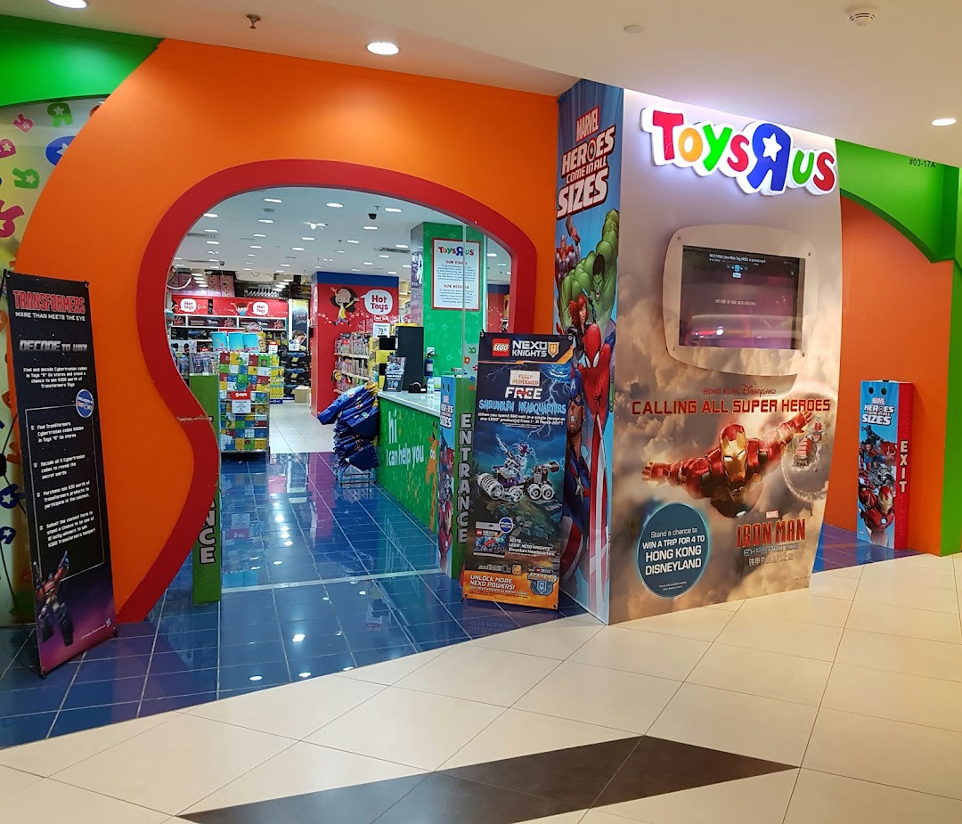 Vibrant entrance of ToysRUs at Tampines Mall, featuring colorful displays and promotional signage.