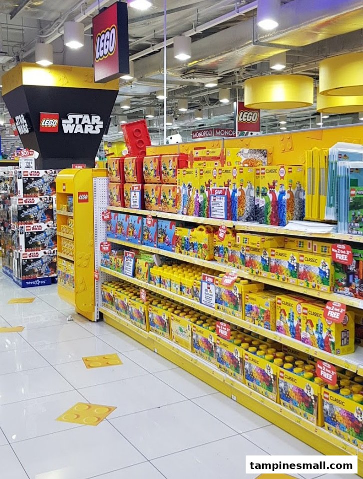 A brightly lit aisle in ToysRUs, showcasing shelves filled with various LEGO sets, including Classic and Star Wars themes.