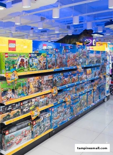 Brightly lit interior of ToysRUs, showcasing extensive shelves filled with LEGO sets and other popular toys.