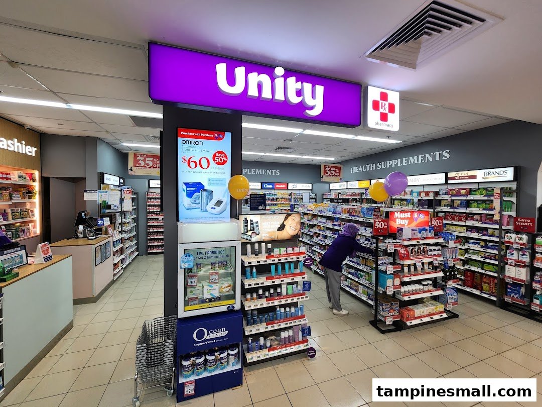 Interior view of Unity pharmacy, showcasing health supplements, personal care products, and a cashier counter.
