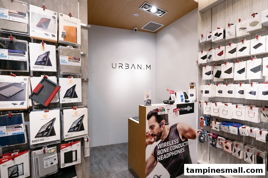 Interior view of URBAN.M, showcasing a wide range of mobile and tablet accessories, and audio devices.
