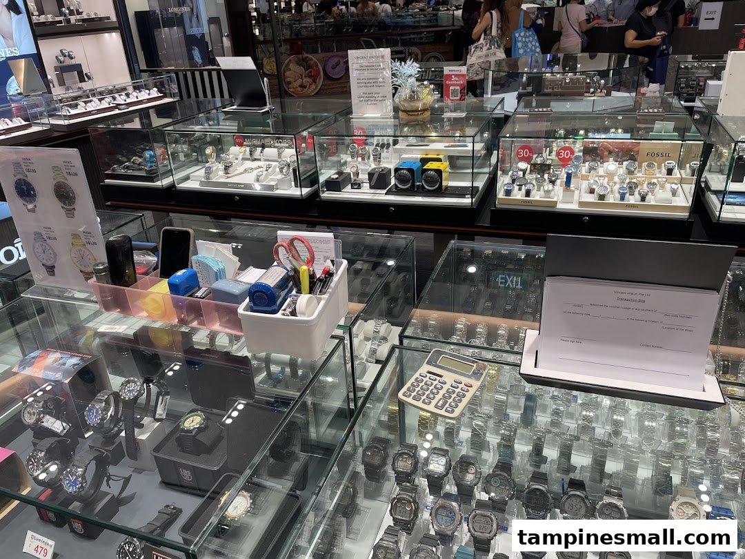 Interior view of Vincent Watch, showcasing numerous display cases filled with a wide selection of watches.
