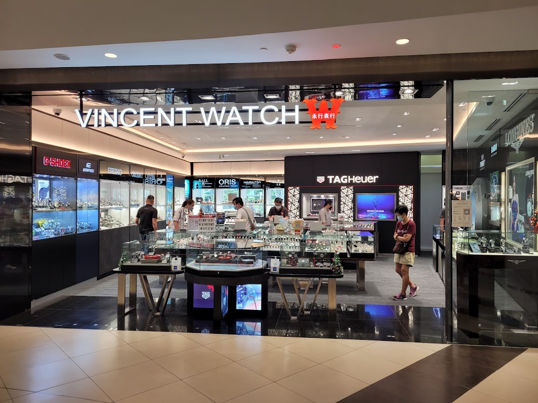 View of Vincent Watch shop entrance showcasing a wide array of luxury timepieces and popular watch brands.