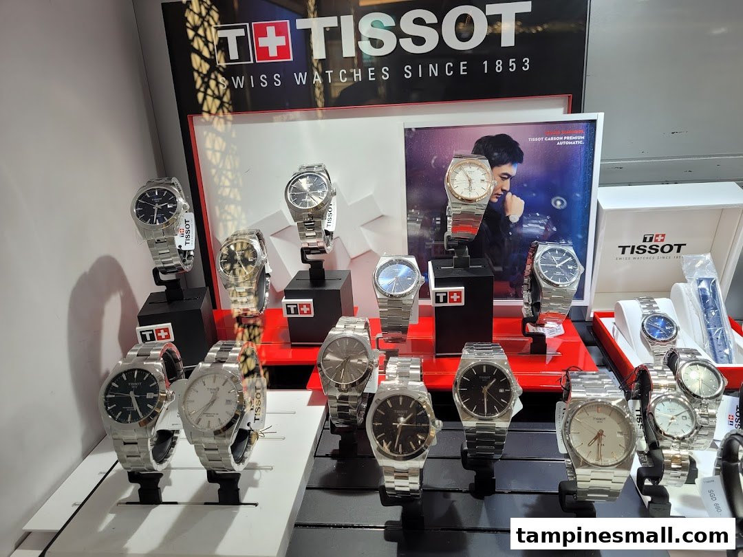 A vibrant display showcasing a variety of Tissot Swiss watches in a retail setting.