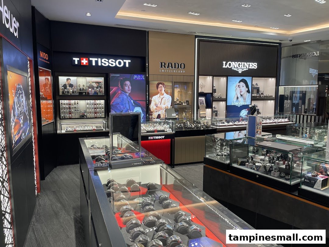 Interior view of Vincent Watch store showcasing luxury timepieces from brands like Tissot, Longines, and Rado.