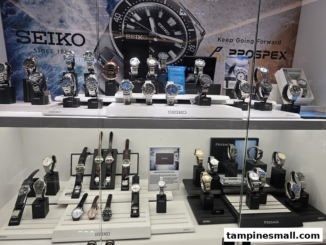 A vibrant display case showcasing a wide range of Seiko watches, including Prospex and Presage collections.