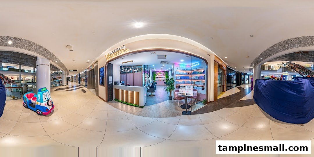 The inviting entrance of Vintage Studio VS Salon & Hairdressing, showcasing its modern interior within Tampines Mall.