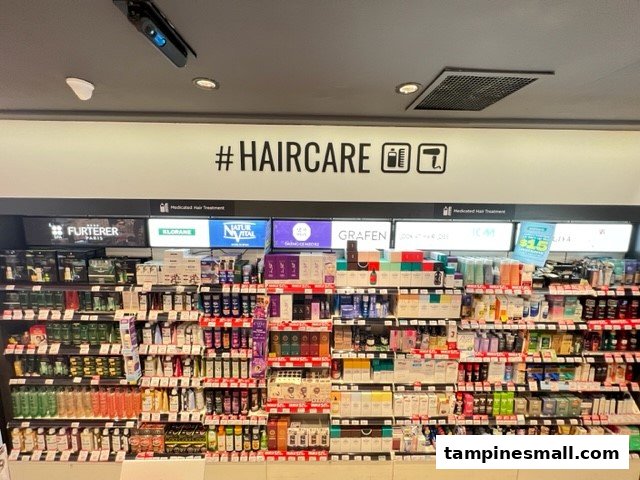 A brightly lit display wall showcasing a wide variety of hair care products and brands at Watsons.